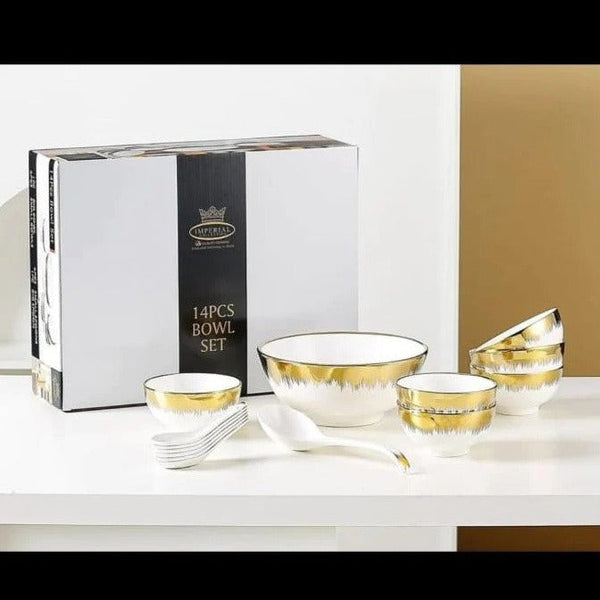 14pcs Aurulent Dripping Pattern Bowls Set, featuring one large bowl, six small bowls, six soup spoons, and one soup serving spoon, with the box in the background, all displayed on a tabletop.