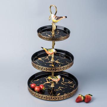  3-tier cake stand with elegant Versace black marble pattern, showcased on a white backdrop.