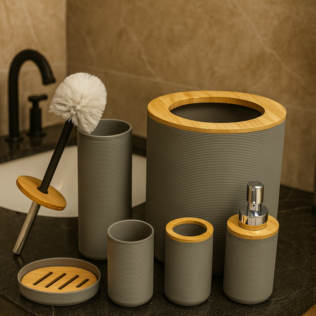 Bathroom accessories set with gray containers and wooden accents on a bathroom counter.