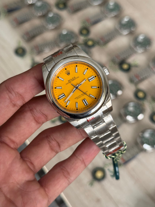 OYESTER PREPETUAL SILVER CHAIN YELLOW DIAL