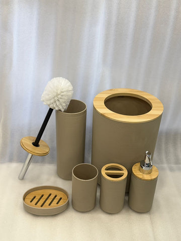 Set of bathroom accessories including a scrubber, brush holder, and various containers on a white background. Color Beige 