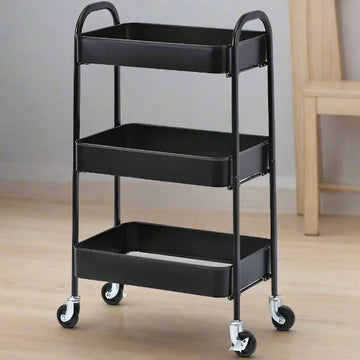 A black 3 compartment kitchen trolley made of metal, featuring three shelves and four caster wheels for mobility.
