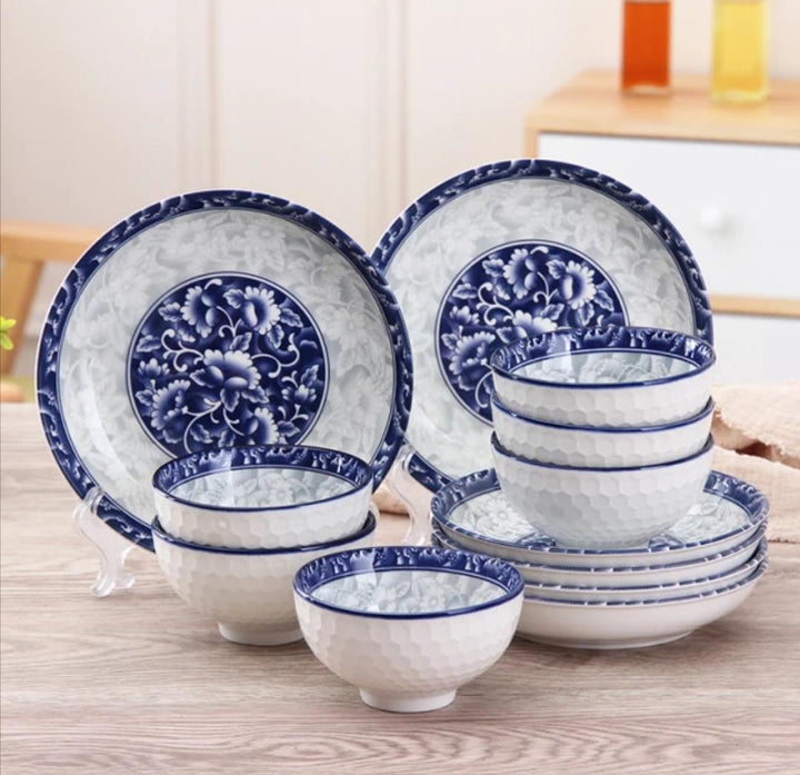 Close-up of 6 bowls, 2 large plates, and 4 small plates from the Ceramic Bluish Dinner Set, highlighting the elegant blue and white design.