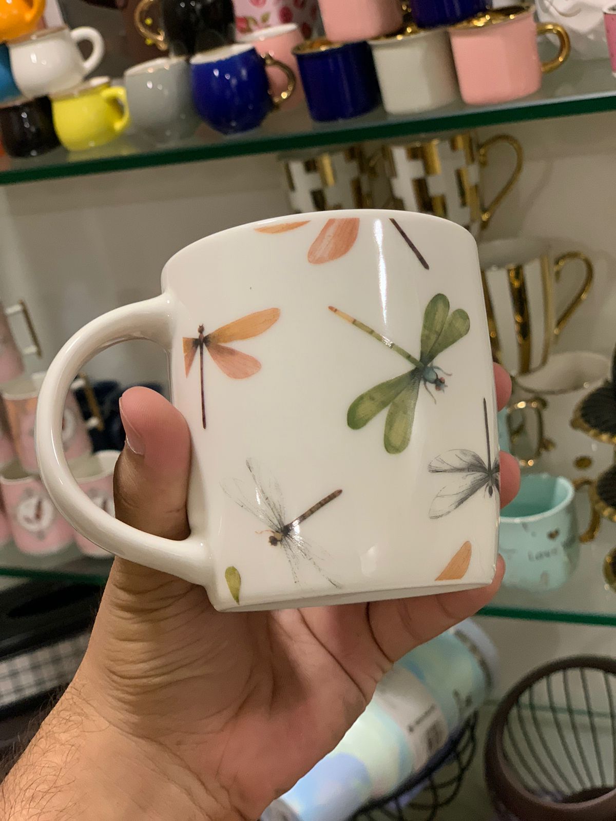 Close-up of Danny Home™ mug showcasing a delicate dragonfly design.