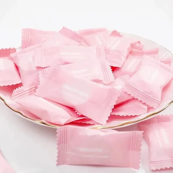 Compressed towel tablets presented on a plate, showcasing their use on a dining table after meals.