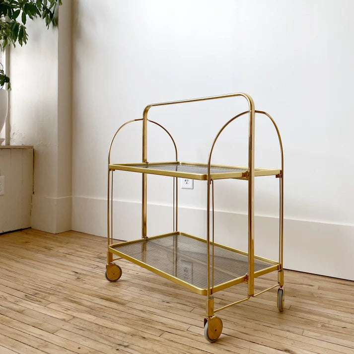 Different angle of the empty bar cart trolley, showcasing its stylish and practical design in an interior setting.