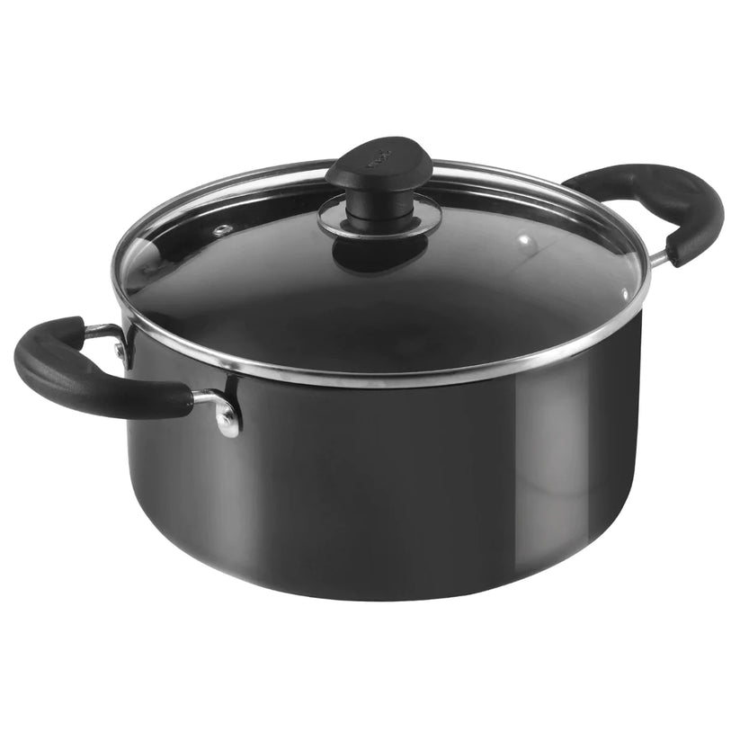 Hard anodised sauce pot with lid placed on a tabletop, showcasing its sleek design and non-stick surface.