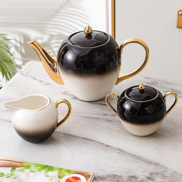 Premium Tea Set – Close-Up of Teapot, Creamer, and Sugar Bowl with Gold Accents