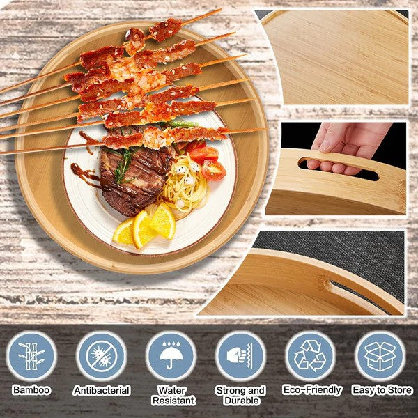 Round bamboo serving tray with hot beef skewers on top, being picked up by hand using the handles.