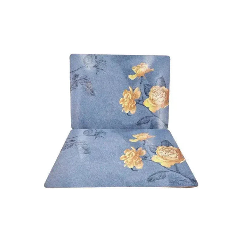 Set of 3 blue floral table mats arranged on a dining table, showcasing their elegant design, durable material, and functionality for everyday and formal use.
