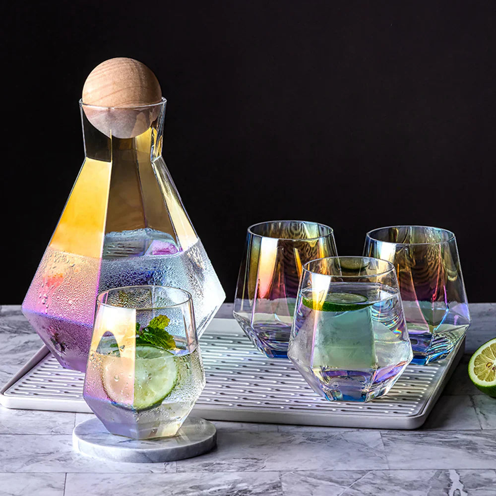 Showcasing the colorful water jugs and matching glasses with ball lids, arranged elegantly for a vibrant and functional drinkware set.