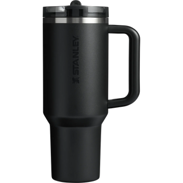A black Stanley Quencher ProTour Flip Straw Tumbler with a handle and a clear screw-on lid.