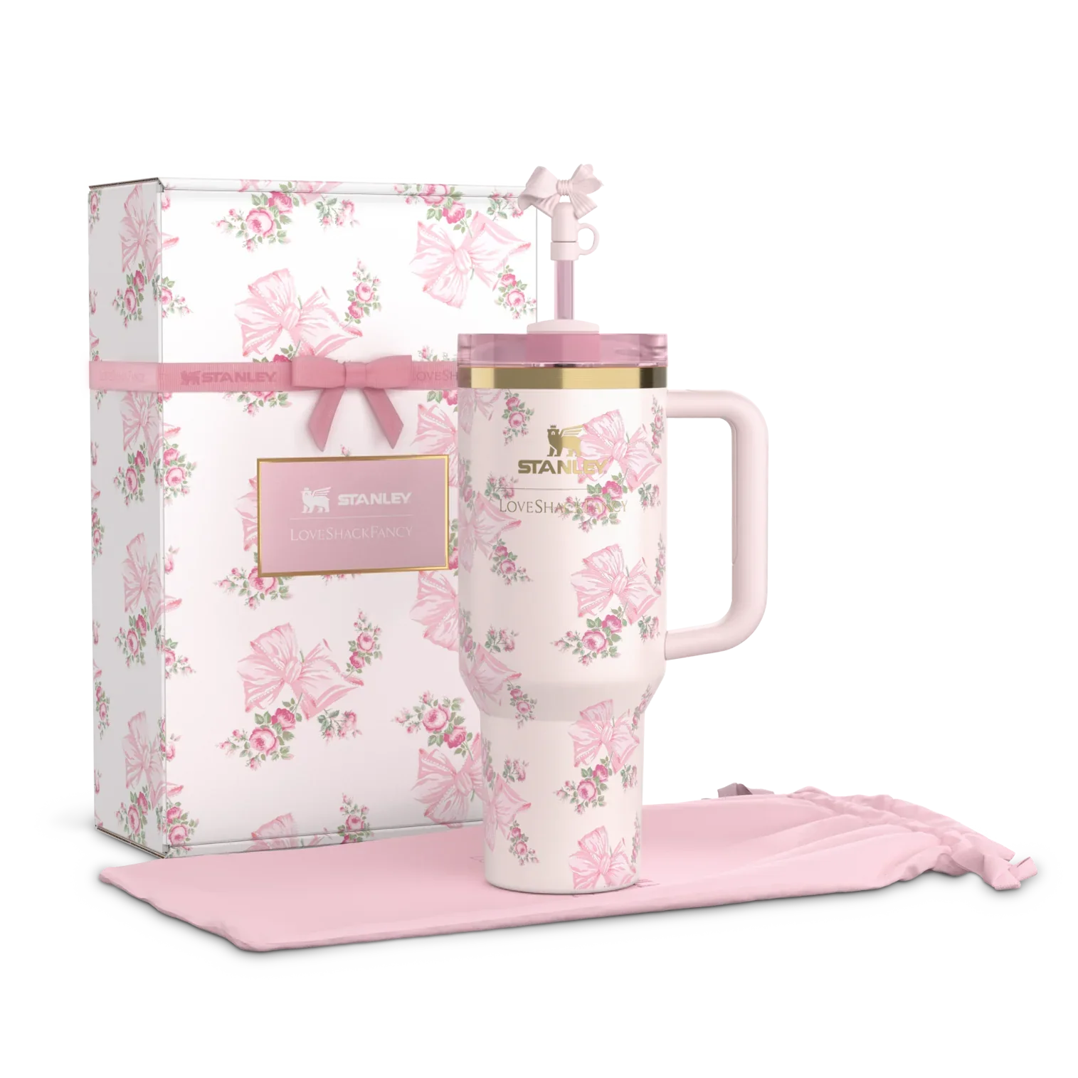 A pink floral-patterned tumbler with a FlowState lid, displayed alongside its packaging box and a pink fabric coaster.