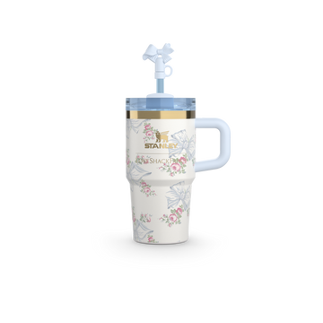A white tumbler with a floral pattern and a blue screw-on lid. 20oz