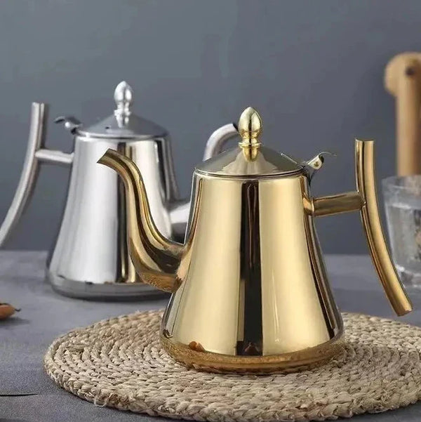 Two Luxury Tea Pot Kettles shown, one in silver and the other in gold, showcasing elegant design and finish.