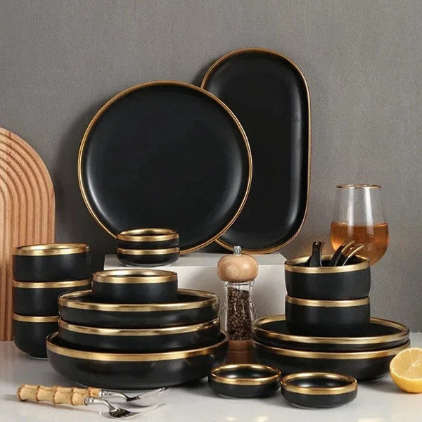 Showcasing the complete European Porcelain Dinner Set, including plates, bowls, spoons, tray, and sauce bowls in black with gold trims.