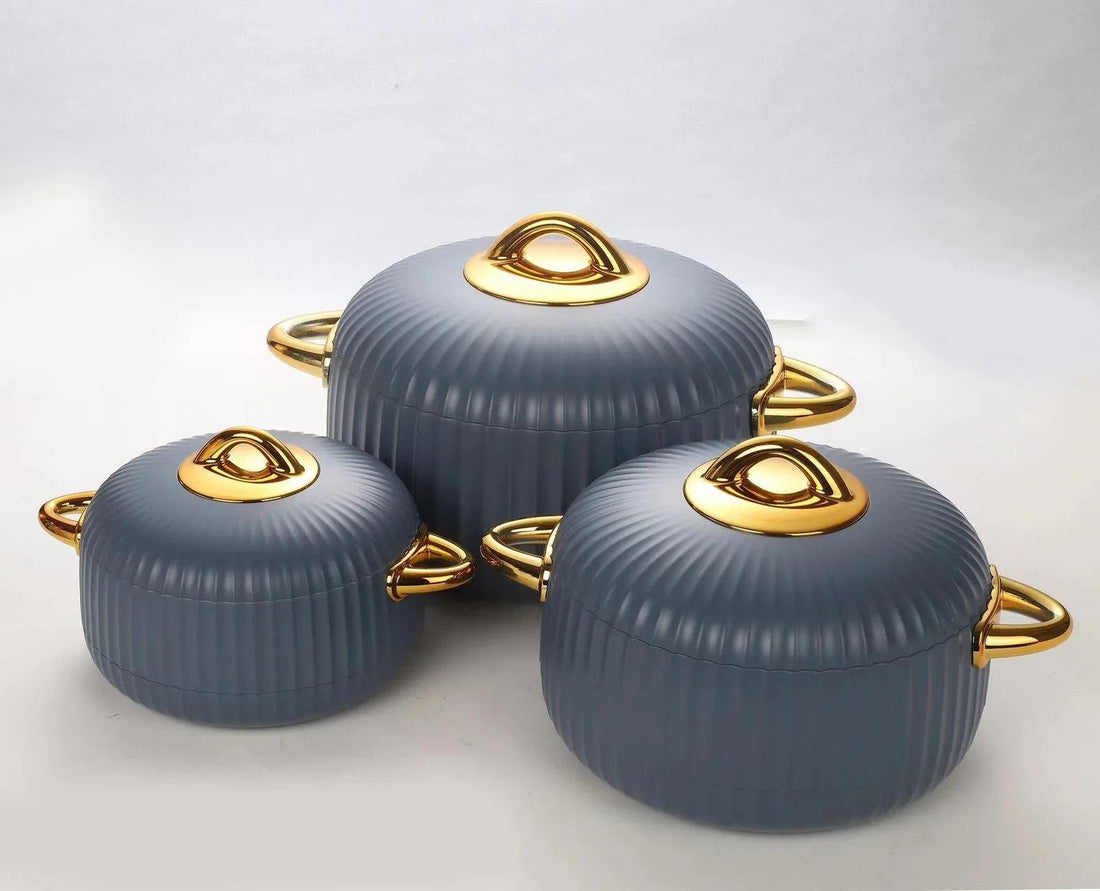 Three green hot pots/food warmers elegantly arranged on a tabletop, showcasing the Elegant Luxury Insulated Hot Pots Set of 3.