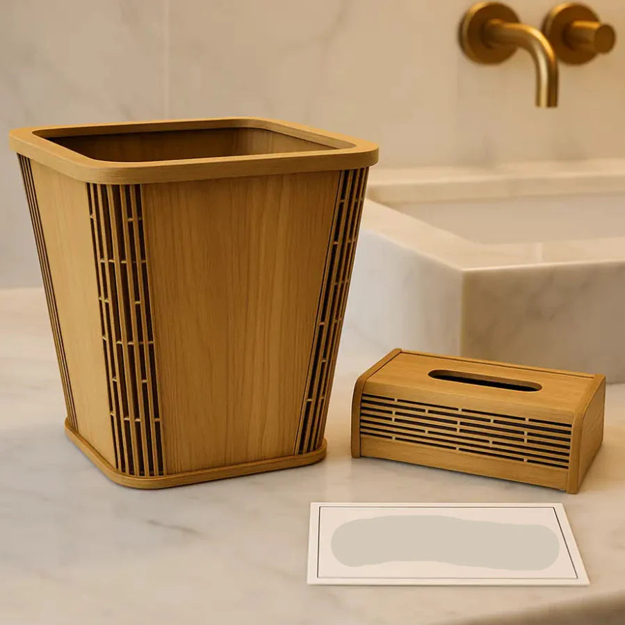 Wooden trash can and tissue box on a bathroom counter with a gold faucet in the background.