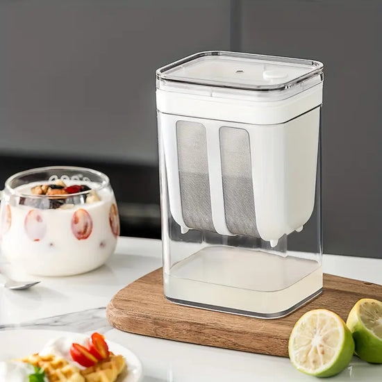 Clear container with a white lid on a wooden cutting board, surrounded by food items.
