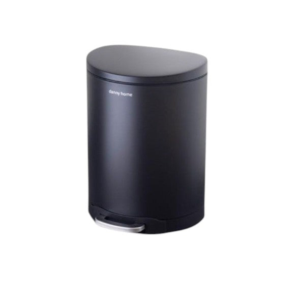 Black trash bin on a wooden pedestal against a gray wall